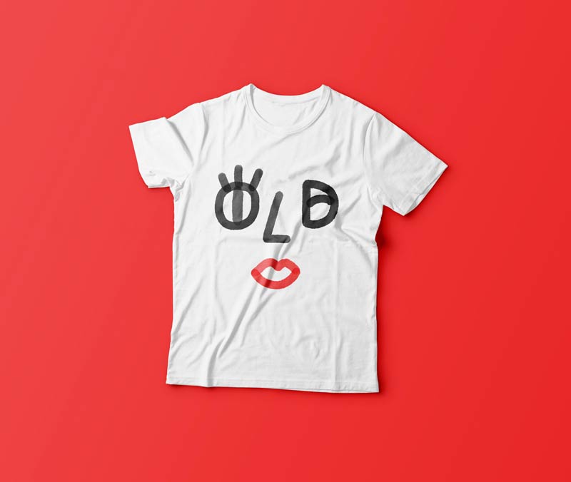 A white t-shirt with an illustrated winking face printed on the front.