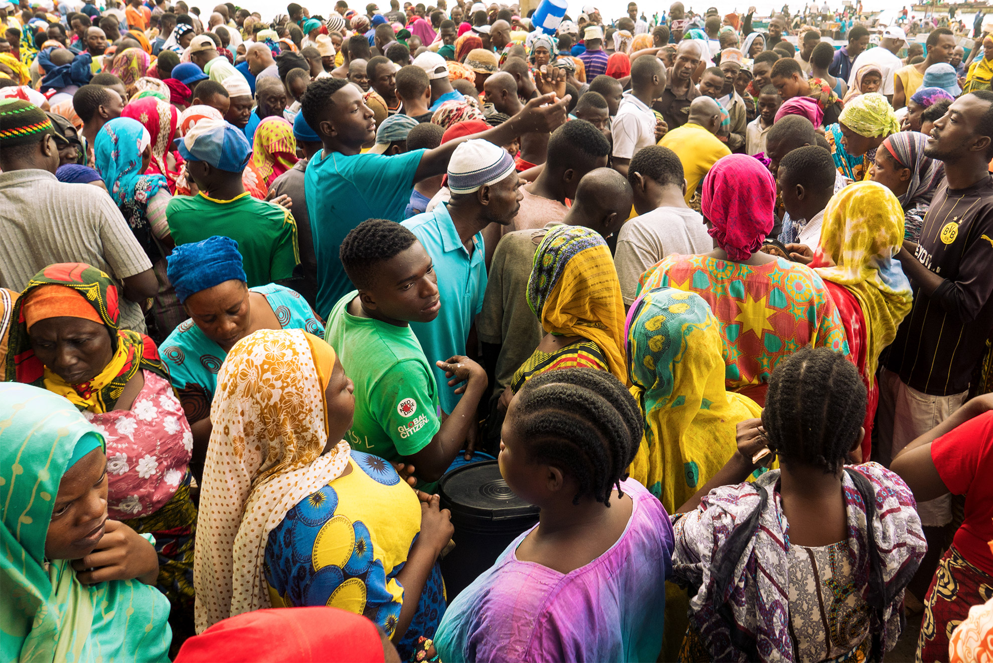 Close-up of many people crowded together at the market