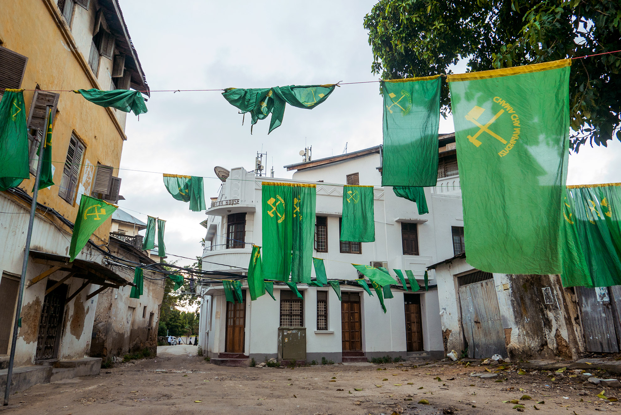 Flags hanging between buildings